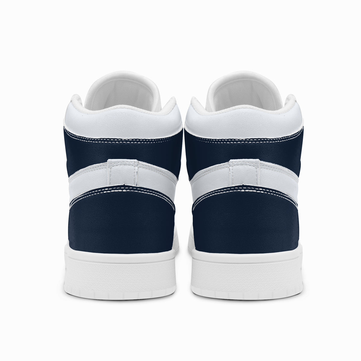 Rear view of navy blue and white high-top sneakers displaying dark navy heel counters, white collar bands, and two-tone white and dark grey rubber outsoles.
