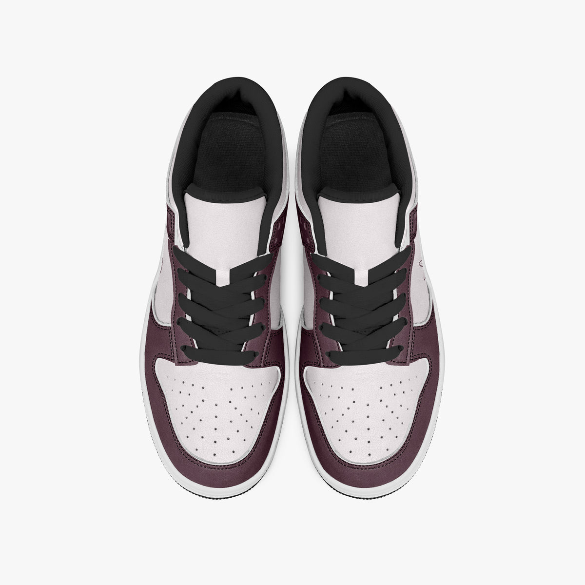 Overhead view of burgundy and pale pink sneakers displaying black laces, black padded collar lining, and perforated pale pink leather toe boxes.