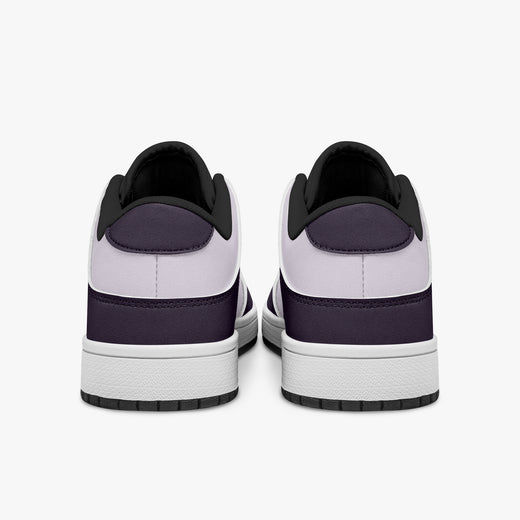 view of plum purple and lilac sneakers showing deep purple heel overlays, pale lilac leather collars, and black interior collar lining above white midsoles.