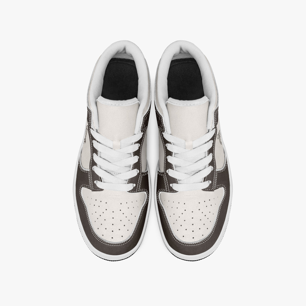 Overhead view of brown and cream sneakers showing clean white laces, white padded collar lining, and perforated cream leather toe boxes.