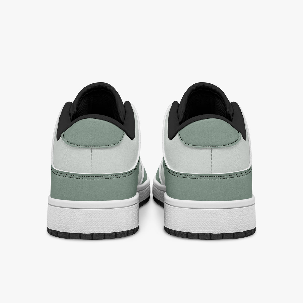 Rear view of sage green and off-white sneakers showing sage green heel overlays, off-white leather collars, and black interior collar lining above white midsoles.