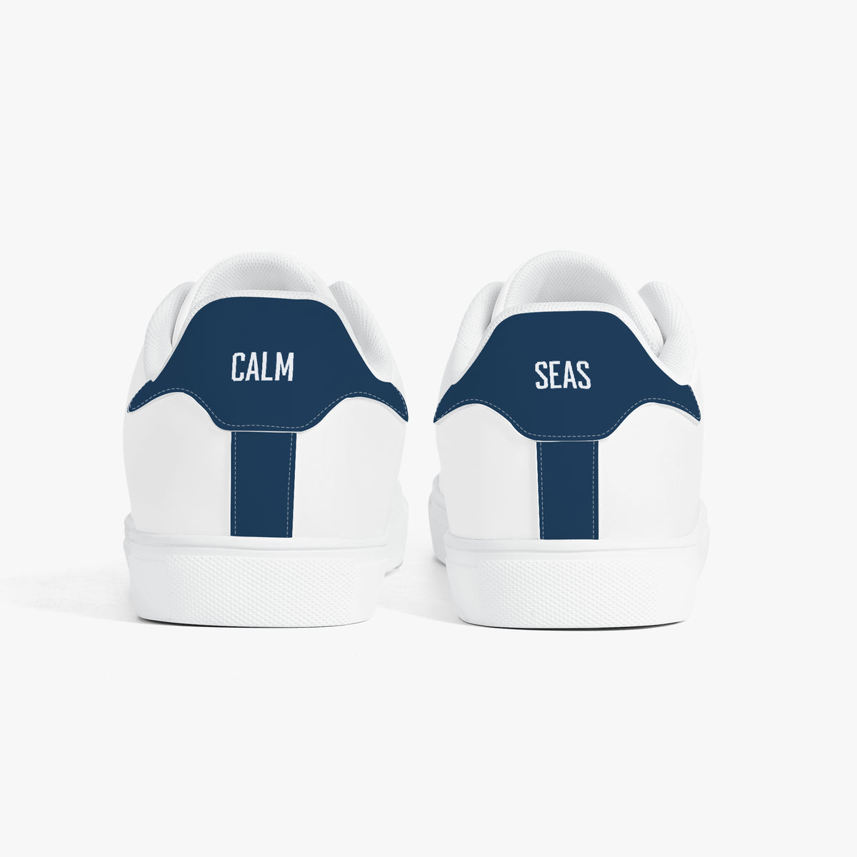 White sneakers with green accents and turtle design on a white background