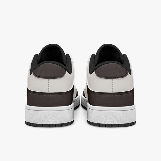 Rear view of dark brown and off-white sneakers showing dark brown heel overlays, off-white leather collars, and black interior collar lining above white midsoles.