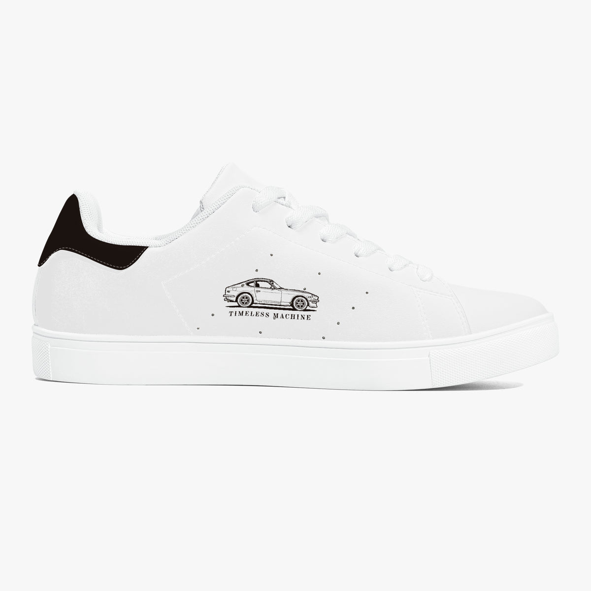 Side profile view of the right sneaker displaying the "TIMELESS MACHINE" classic coupe car illustration, tonal white stitching, and matching white sole facing right.