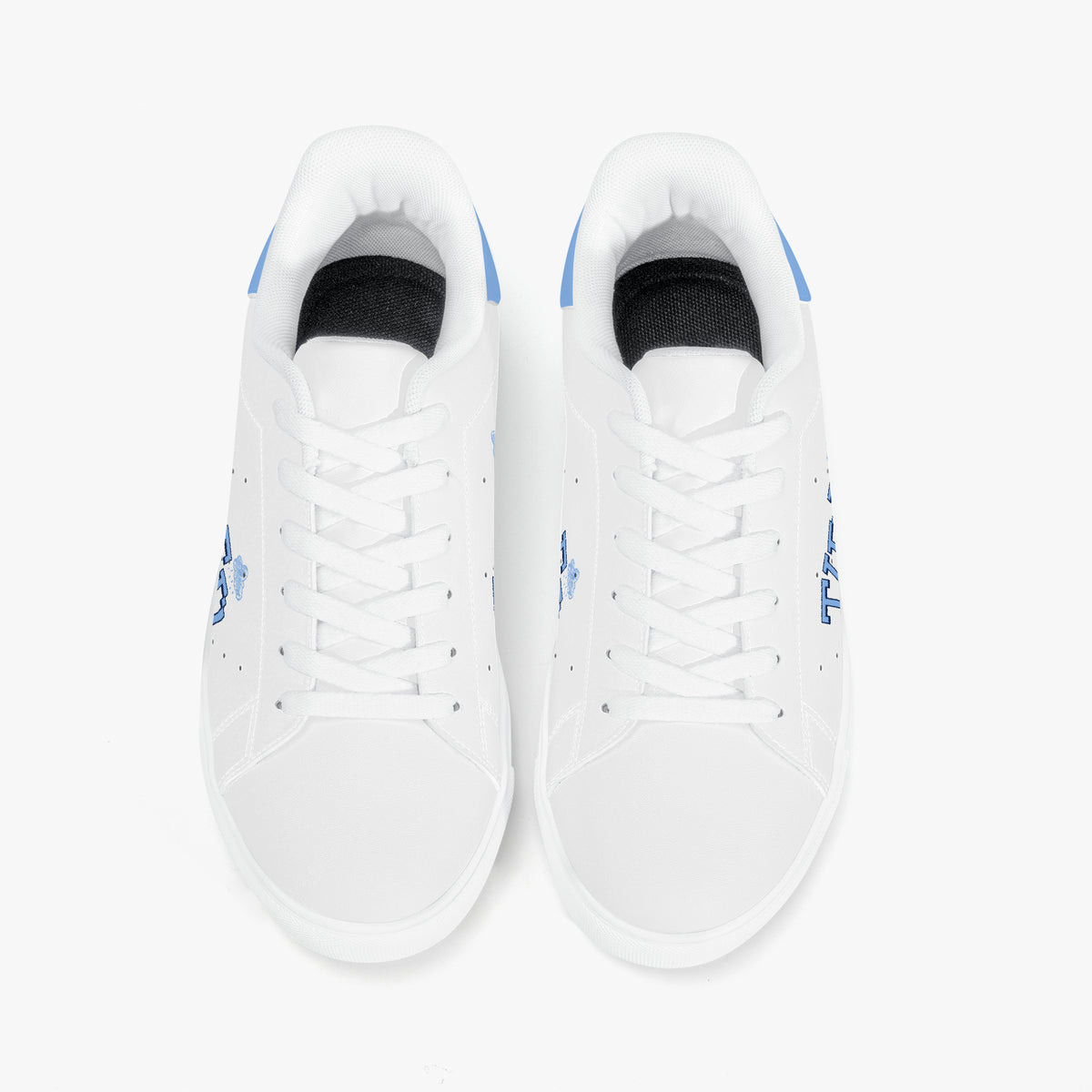 White sneakers with blue accents on a white background