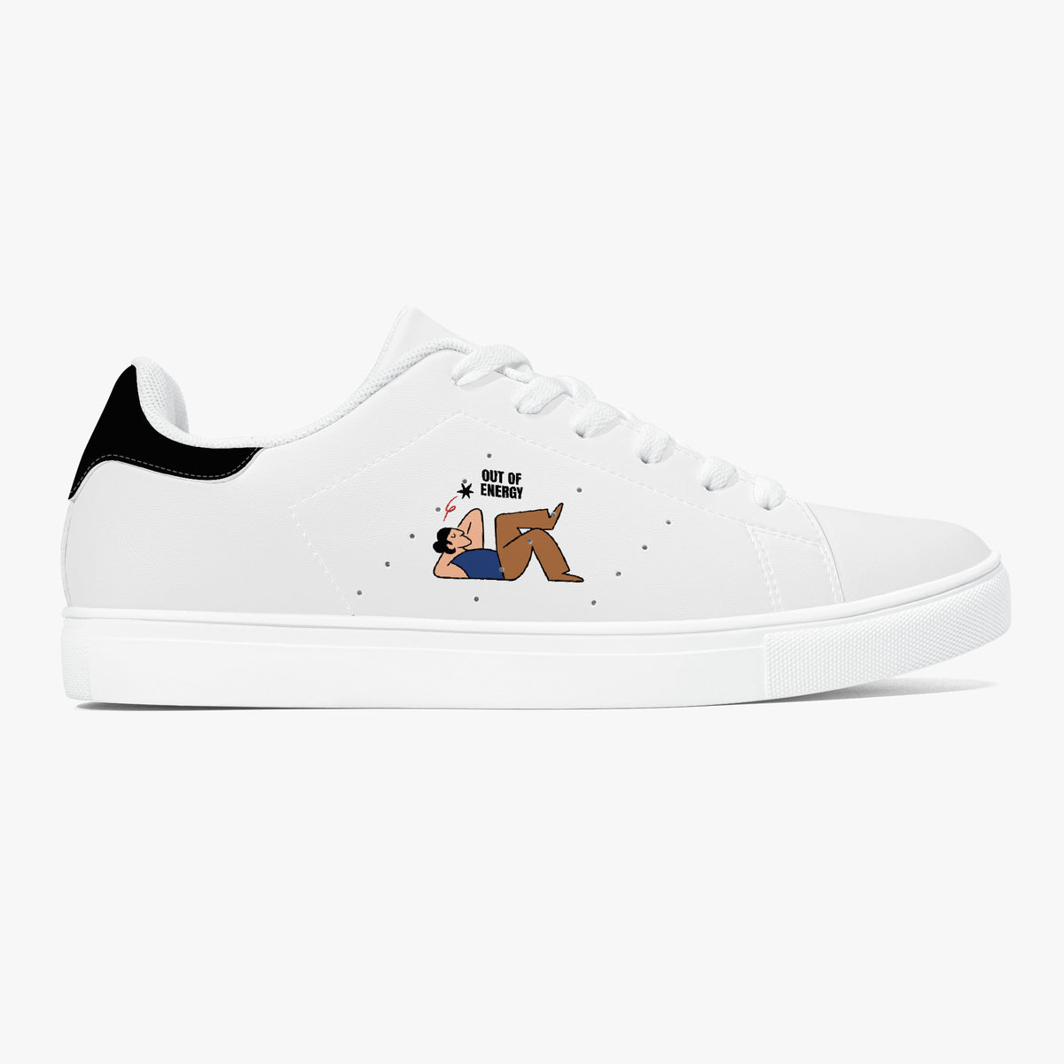 A white low-top sneaker with a black heel tab and a cartoon graphic on the side showing a person lying down with the text 'GET UP SHIT!'.
