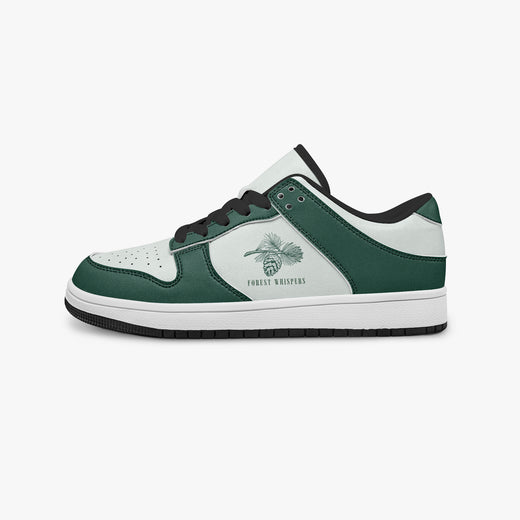 Side profile view of the left sneaker highlighting the green leather panels, pine cone emblem, black interior lining, and flat rubber sole facing right.