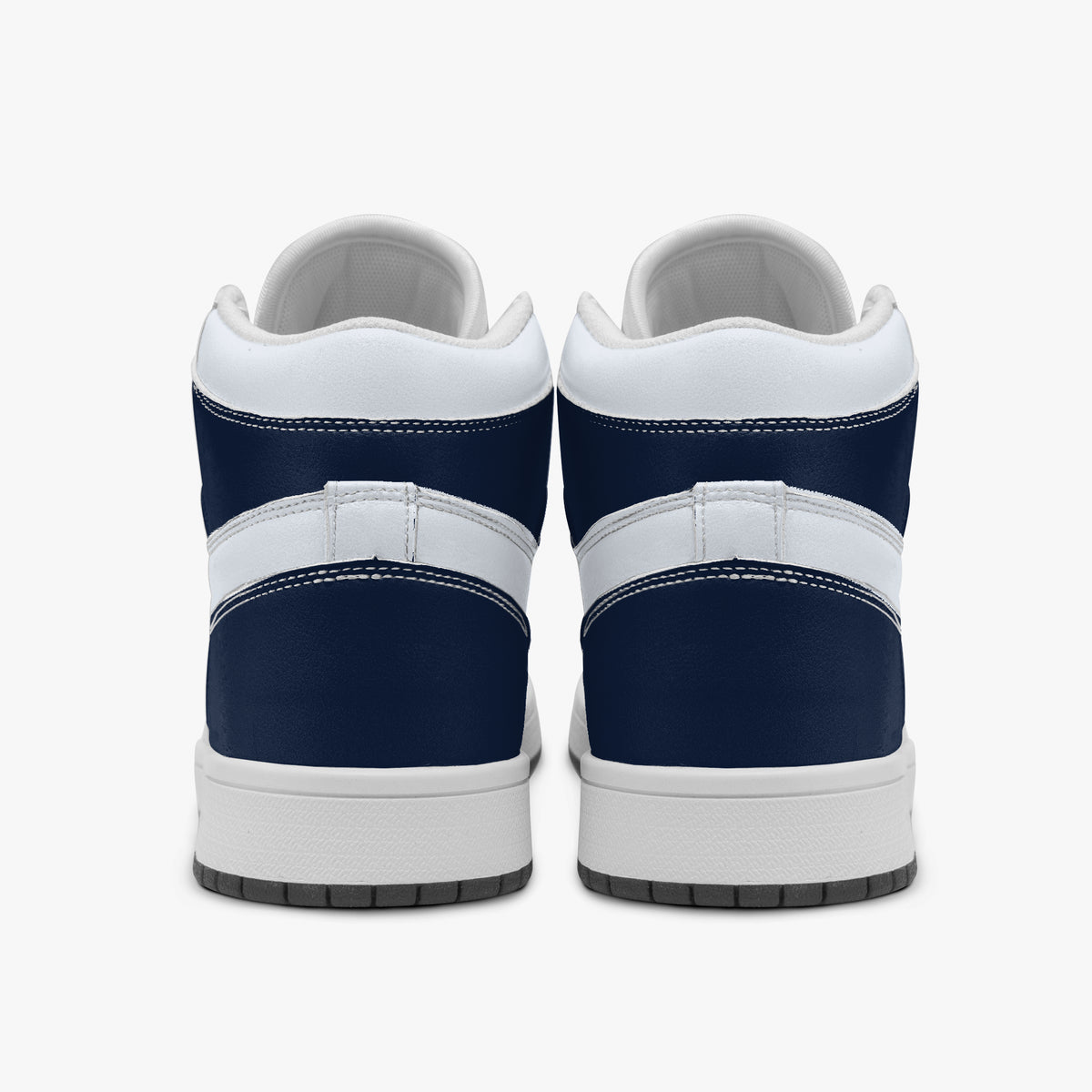 Centered rear view of high-top sneakers showing dark navy leather heel wraps, white padded upper collars, and clean white midsoles.