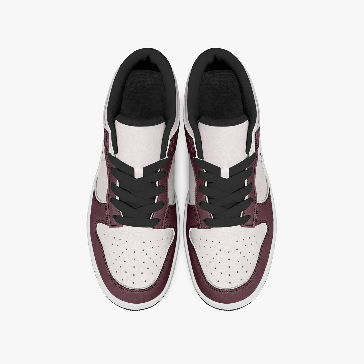 Overhead view of burgundy and pale pink sneakers displaying black laces, black padded collar lining, and perforated pale pink leather toe boxes.