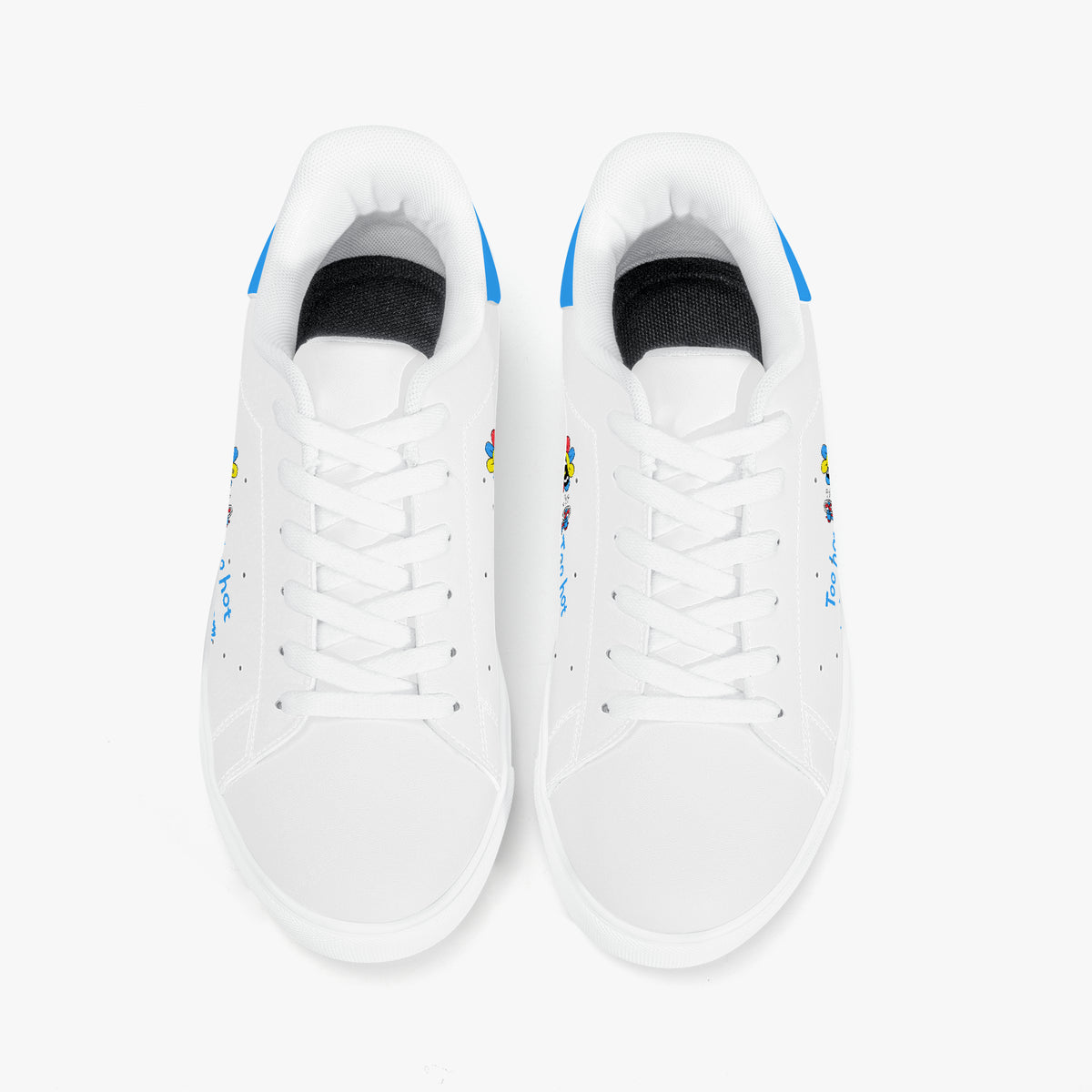 White sneakers with blue accents on a white background