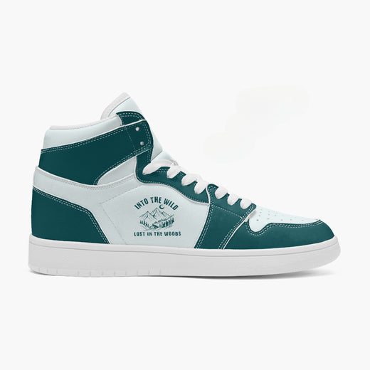 Side profile view of the right high-top sneaker in dark teal and white leather, featuring an outdoor mountain graphic with "INTO THE WILD - LOST IN THE WOODS", white eyelet lacing, and a flat rubber sole facing right.