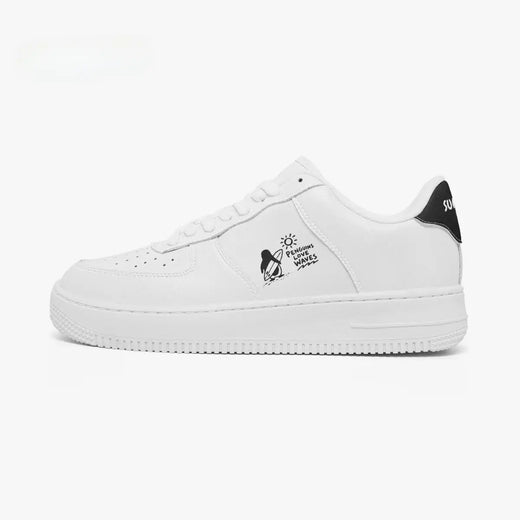 Outer side view of the left sneaker in white leather, highlighting the surfing penguin graphic and black heel accent facing left.