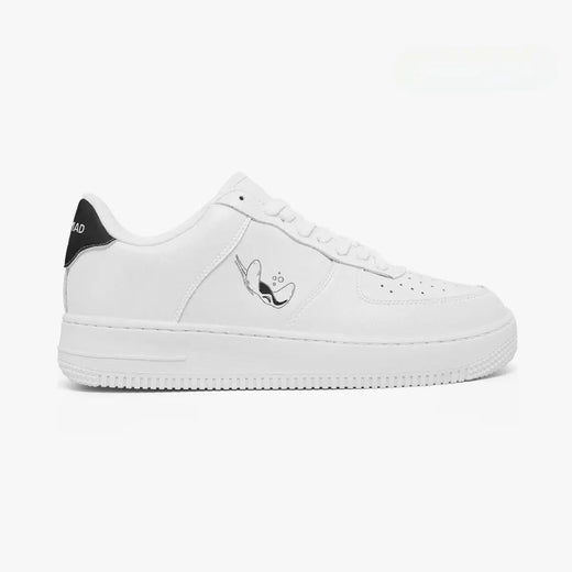 Outer side view of the right sneaker in white leather, highlighting the minimalist stingray print and black heel counter facing right.