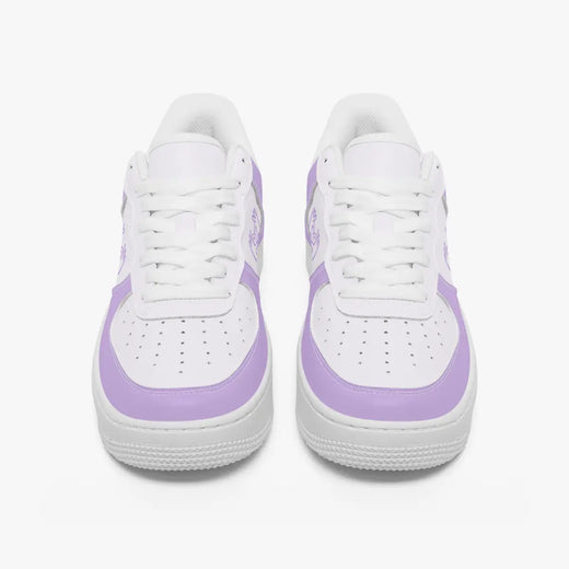 A pair of white low-top sneakers with light purple side panels and matching purple accents on the toe and heel, shown from a front-facing perspective on a light gray background.