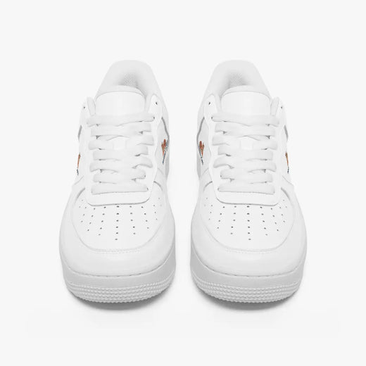 A pair of white low-top sneakers shown from a front-facing overhead angle on a clean white background.