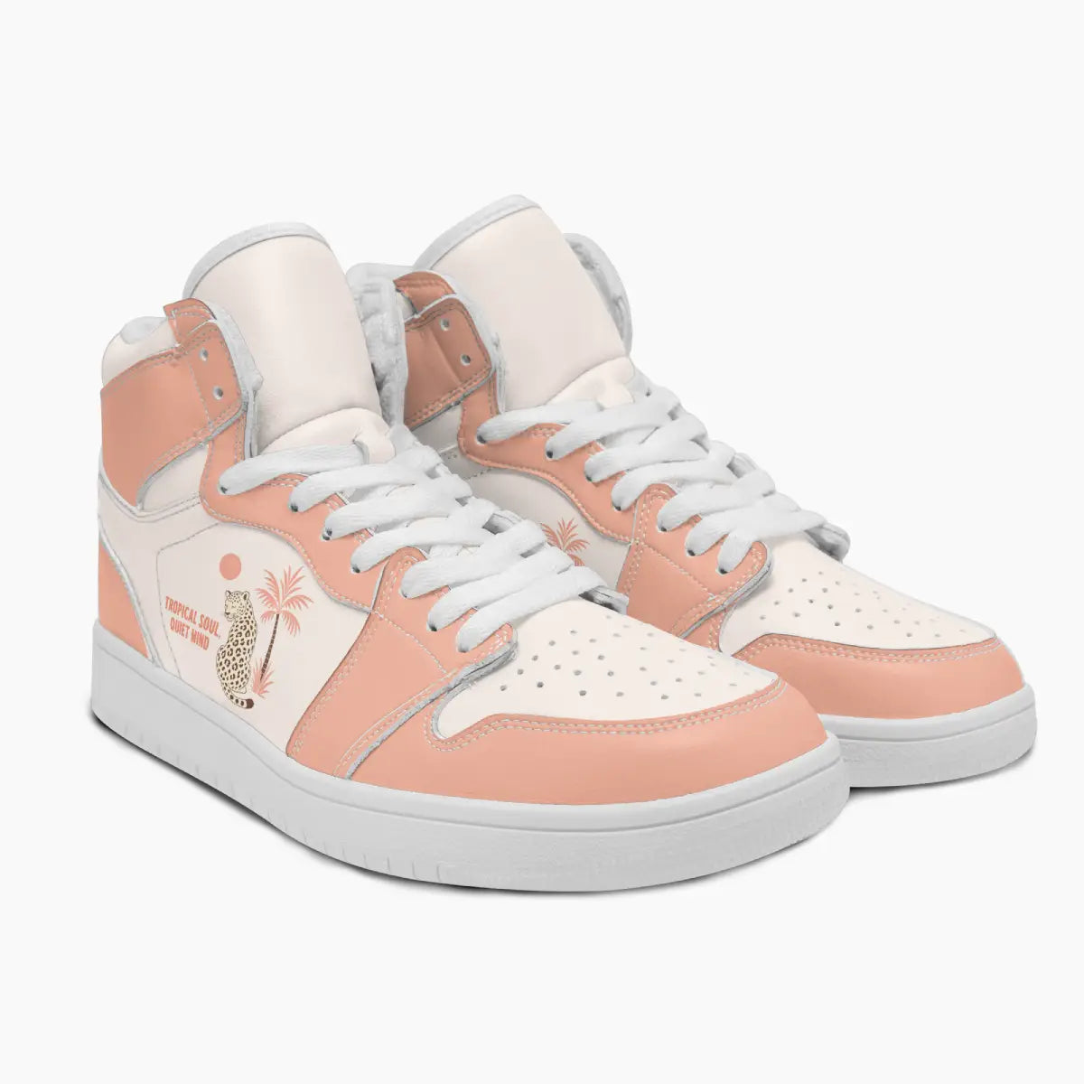 Angled three-quarter view of high-top peach and cream sneakers featuring a leopard, palm tree, and "TROPICAL SOUL. QUIET MIND" graphic.