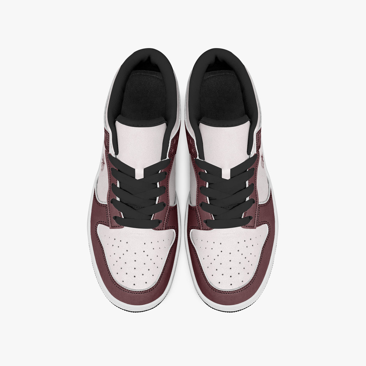 Overhead view of burgundy and pale pink sneakers displaying black laces, black padded collar lining, and perforated pale pink leather toe boxes.