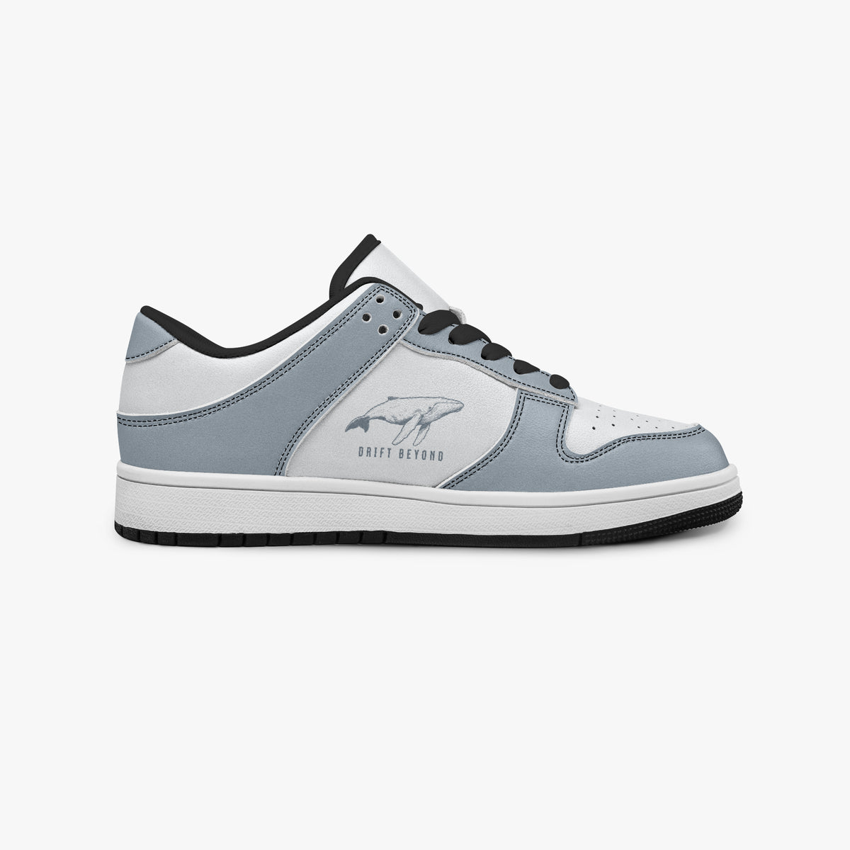 Side profile view of the right sneaker showcasing the slate blue-grey and white color blocking, "DRIFT BEYOND" whale design, black laces, and black rubber outsole facing right.