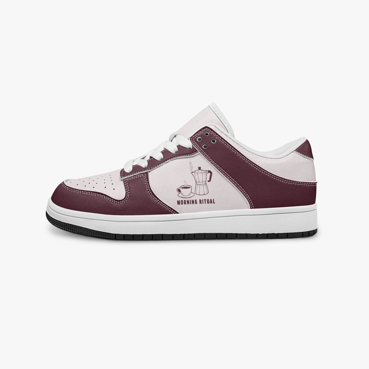 Side profile view of the left sneaker in burgundy and pale pink leather, highlighting the "MORNING RITUAL" graphic, white laces, white interior lining, and flat rubber sole facing right.