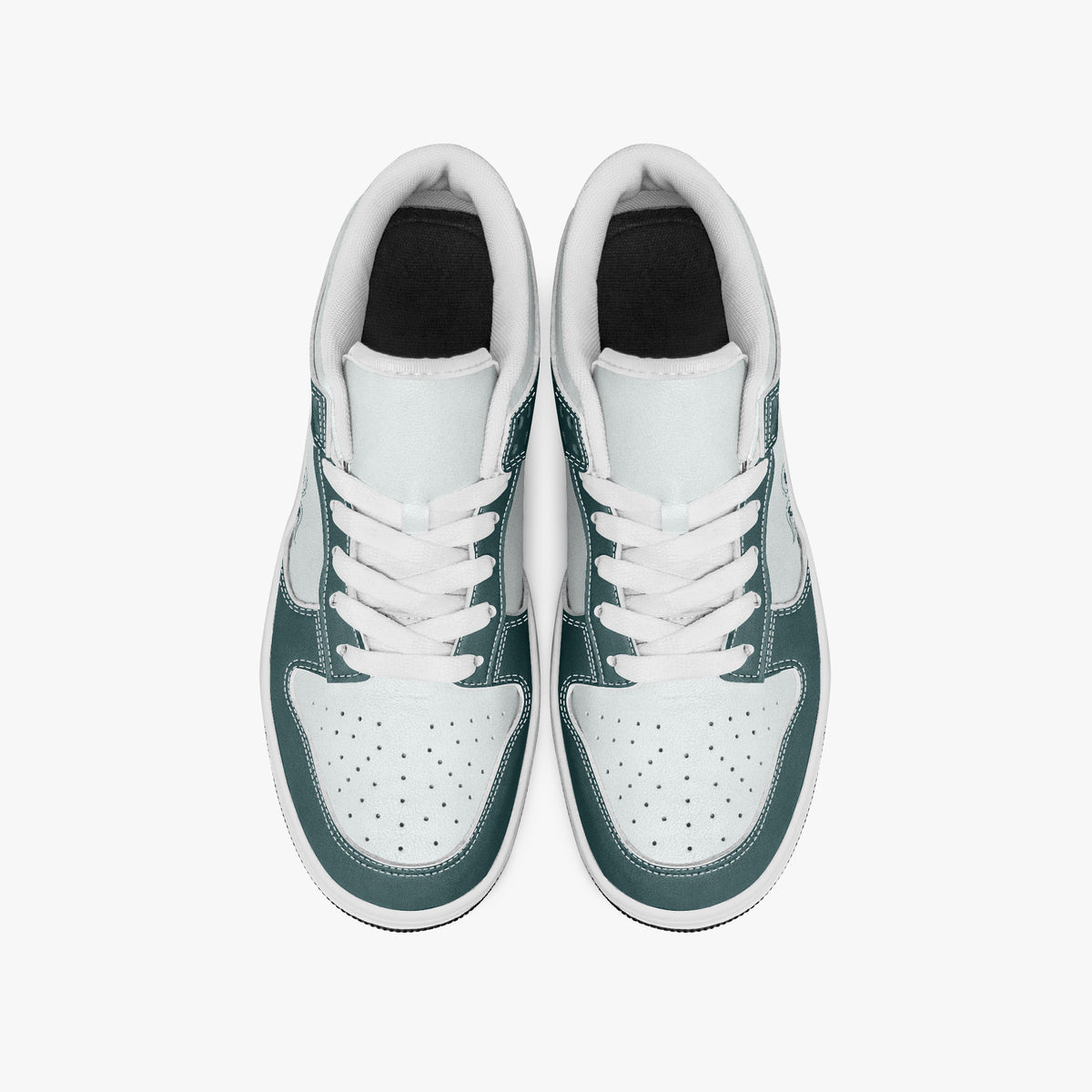 Overhead view of dark teal and white sneakers showing clean white laces, white padded collars, perforated toe boxes, and white leather uppers.