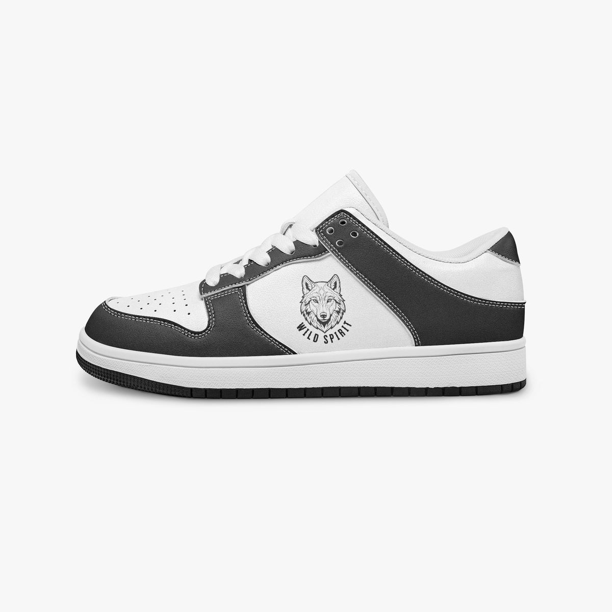 Side profile view of the left sneaker in black and white leather, highlighting the "WILD SPIRIT" wolf graphic, white laces, white interior lining, and flat rubber sole facing right.