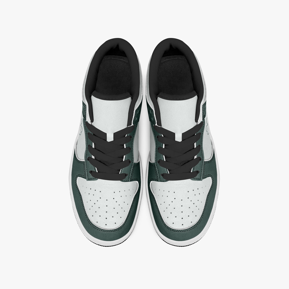 Overhead view of dark green and white sneakers displaying black laces, black padded collar lining, and perforated white leather toe boxes.