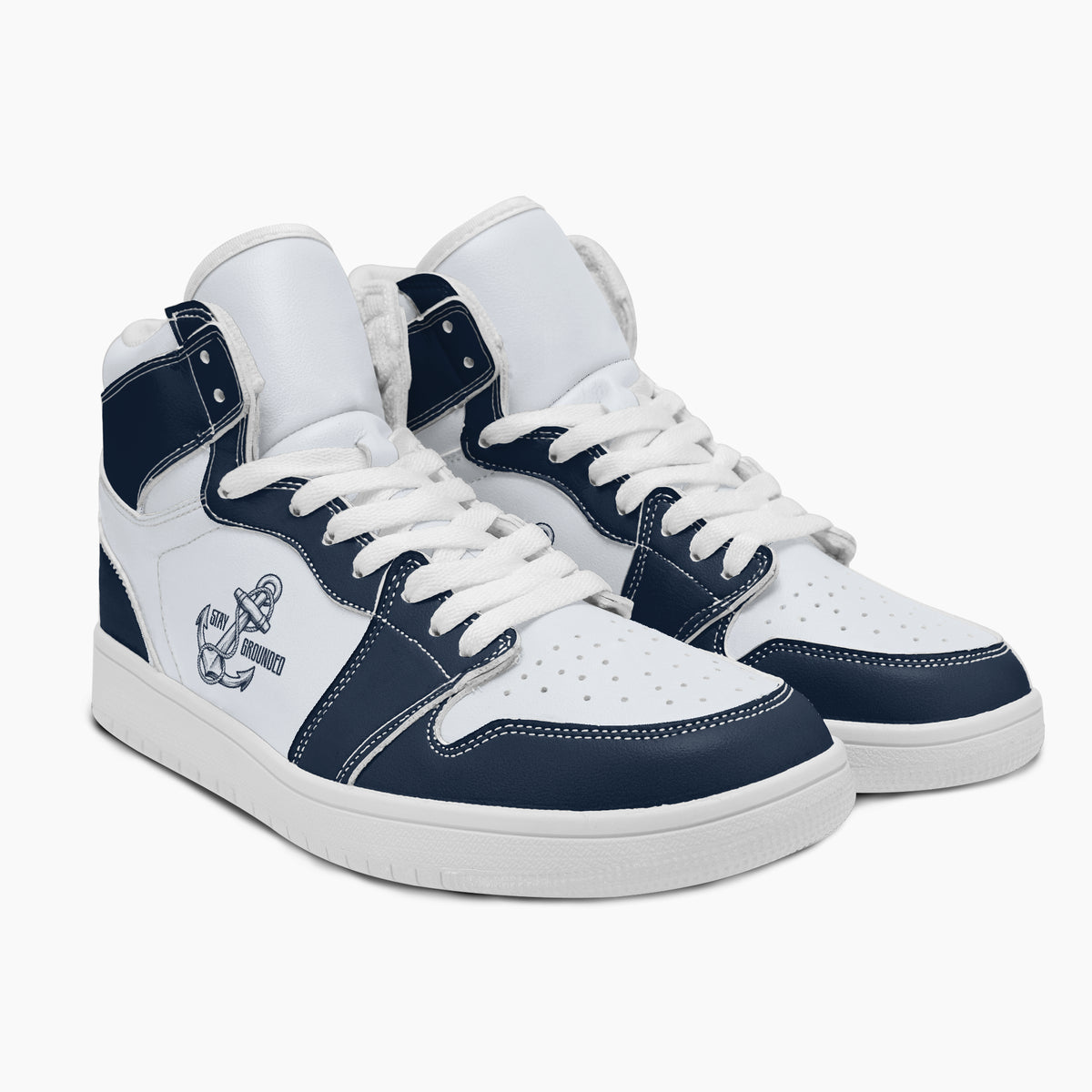 Dynamic three-quarter view of navy blue and white high-top sneakers showcasing the tall collar silhouette, graphic side panels, and clean white rubber midsoles.