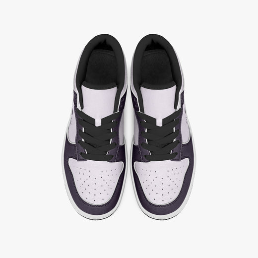 Overhead view of plum purple and lilac sneakers displaying black laces, black padded collar lining, and perforated lilac leather toe boxes.