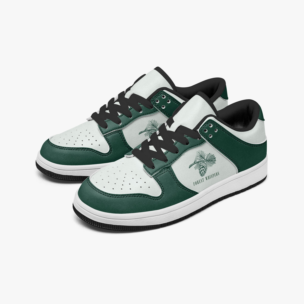 Angled three-quarter view of low-top sneakers in forest green and white leather, featuring a pine cone and branch graphic with "FOREST WHISPERS", black laces, and a black inner lining.