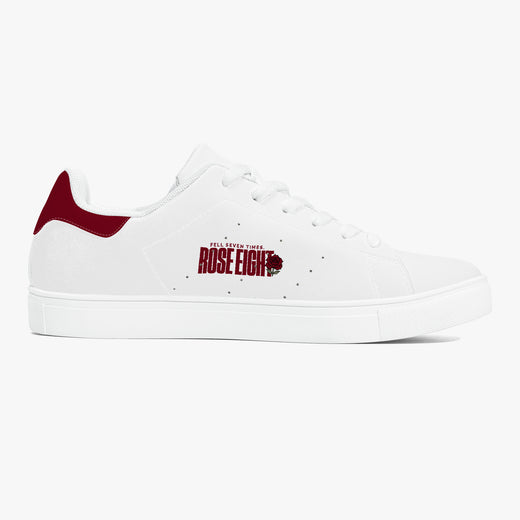 White sneaker with red accents and text on a white background