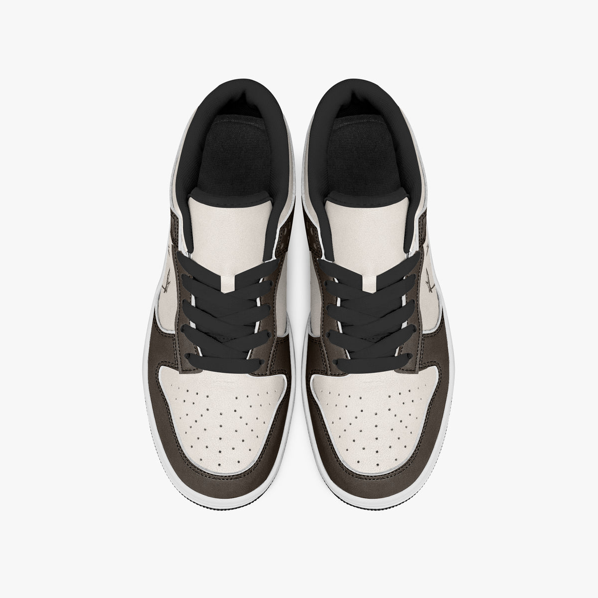 Overhead view of dark brown and cream sneakers displaying black laces, black padded collar lining, and perforated cream leather toe boxes.