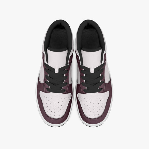 Overhead view of burgundy and pale pink sneakers displaying black laces, black padded collar lining, and perforated pale pink leather toe boxes.