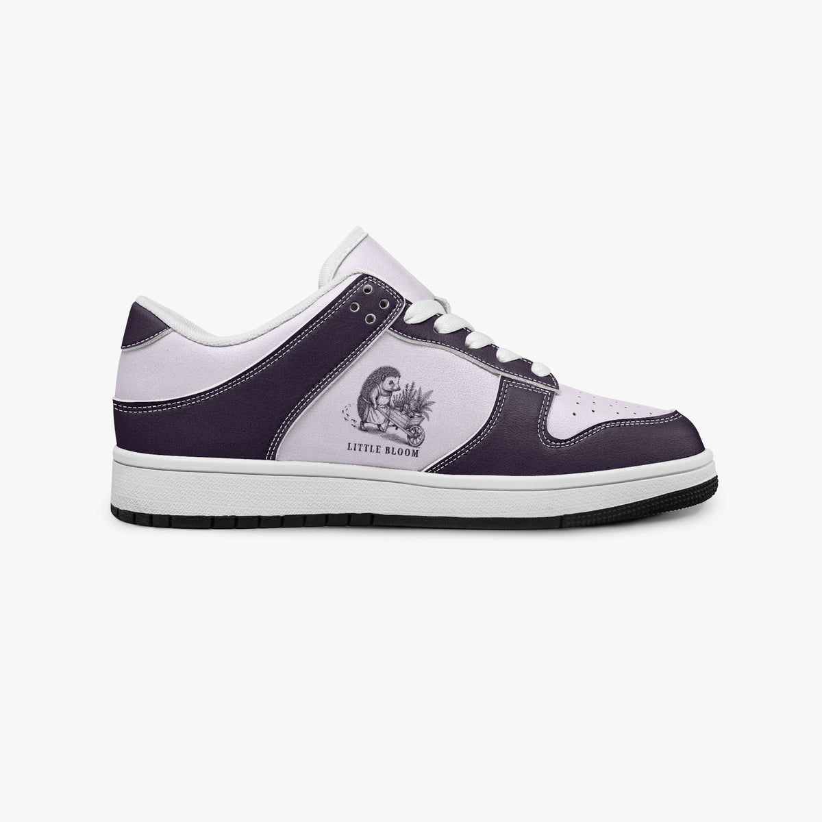 Side profile view of the right sneaker showcasing plum purple leather overlays, hedgehog artwork, white eyelet lacing, and contrasting black outsole facing right.