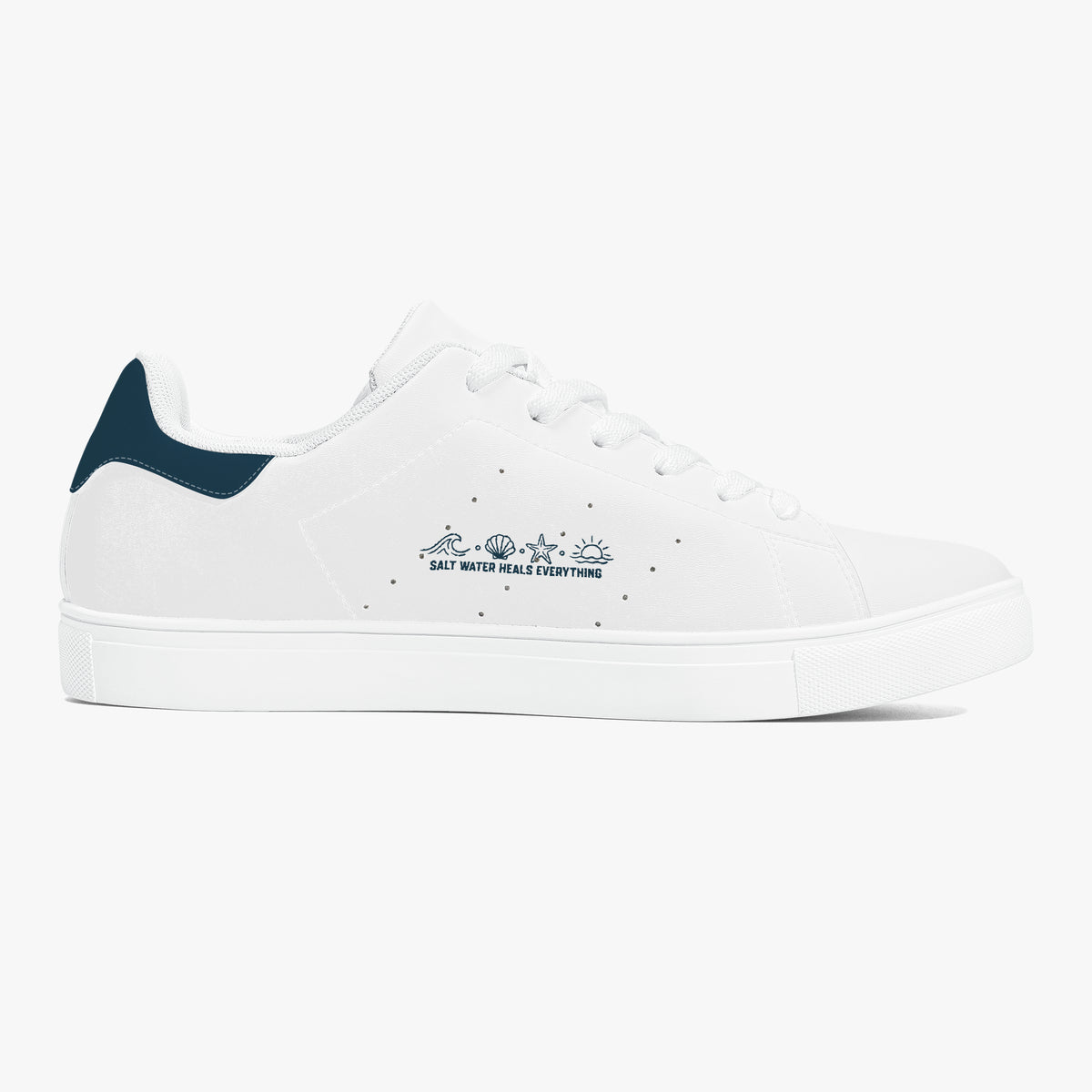 A white low-top sneaker with a dark navy heel tab, white laces, and a navy blue printed graphic on the side reading 'SALT WATER HALO EVERYTHING' with a small fish illustration.