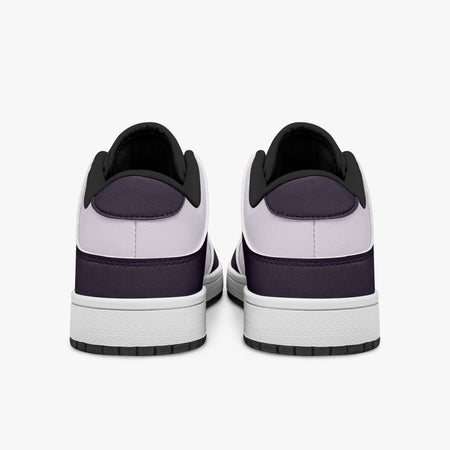 view of plum purple and lilac sneakers showing deep purple heel overlays, pale lilac leather collars, and black interior collar lining above white midsoles.