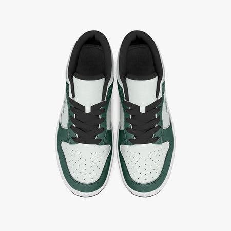 Overhead view of forest green and white sneakers displaying black laces, black padded collar lining, and perforated white leather toe boxes.