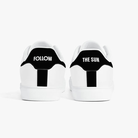 White sneakers with blue accents and 'This is Me Unfiltered' text on a white background