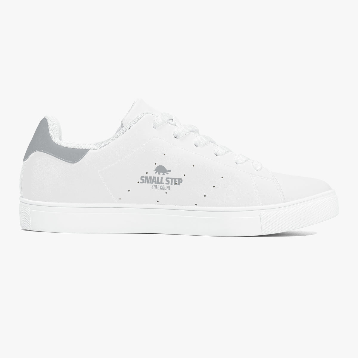 A white low-top sneaker with a gray heel tab and a gray 'SMALL STEP' logo printed on the side, shown in profile against a light gray background.
