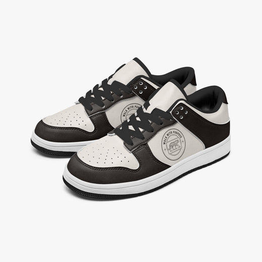 Angled three-quarter view of low-top sneakers in dark espresso brown and off-white leather, featuring a tiger graphic with "WALK WITH PURPOSE", black laces, and a black inner lining.