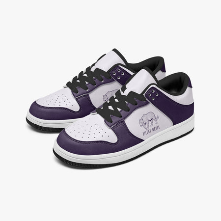 Angled three-quarter view of low-top sneakers in deep purple and white leather, featuring a stealth panther graphic with "SILENT MOVES" and black laces.