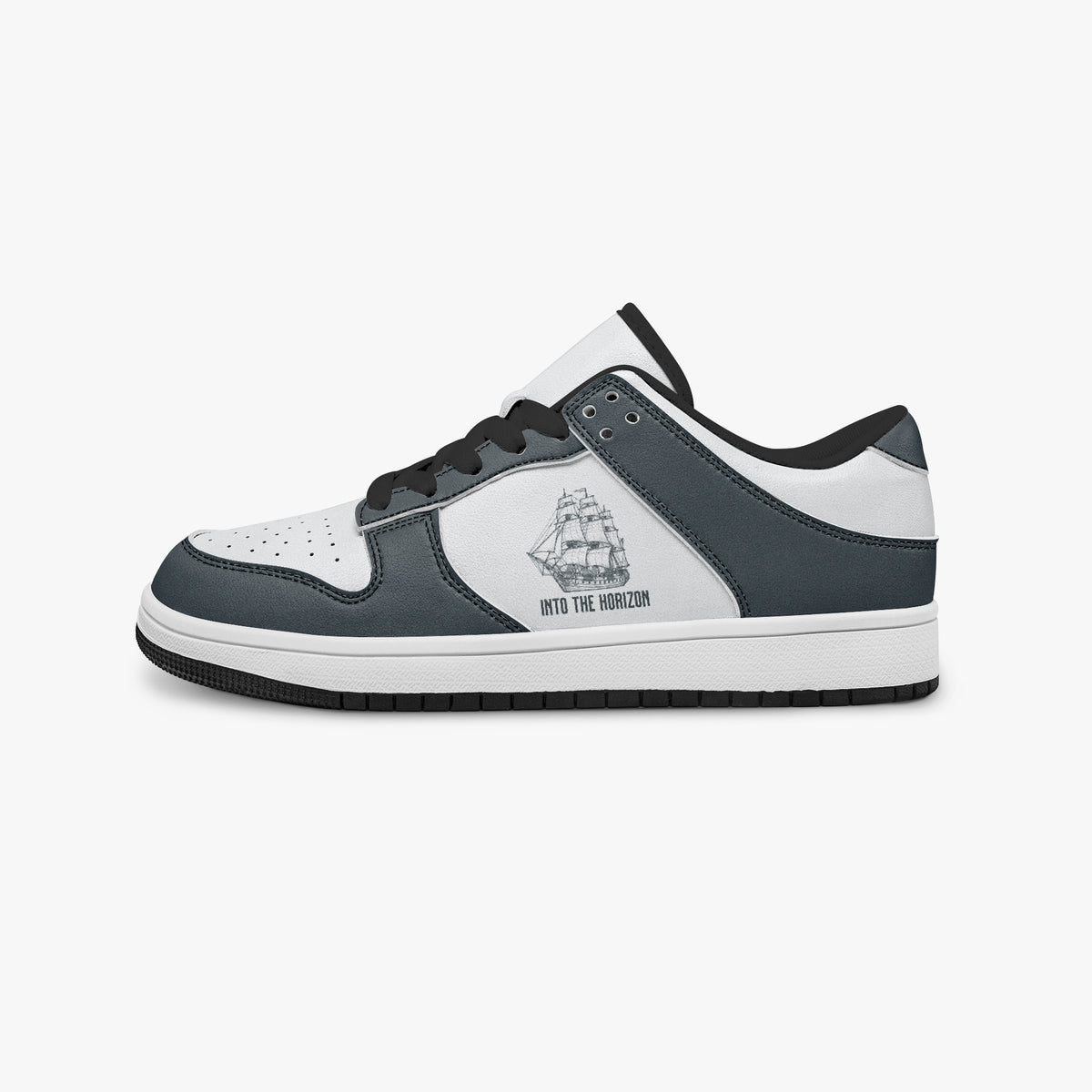 Side profile view of the left sneaker highlighting the slate blue-grey leather panels, tall ship graphic, black interior lining, and flat rubber sole facing right.