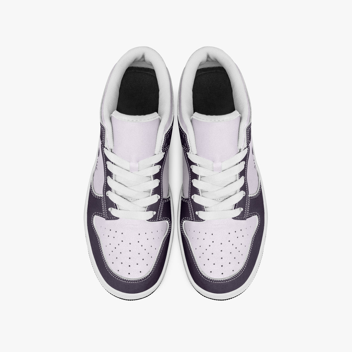 Overhead view of plum purple and pale lilac sneakers showing clean white laces, white padded collar lining, and perforated lilac leather toe boxes.