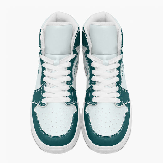 Overhead top-down view of high-top sneakers highlighting dark teal eyestays, white lacing, and perforated white leather vamps.