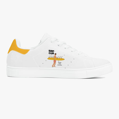 A white low-top sneaker with a yellow heel tab, featuring a cartoon graphic of a surfer carrying a tray with drinks and the text 'SURF CLUB' and 'BODY OF MYOVER'.
