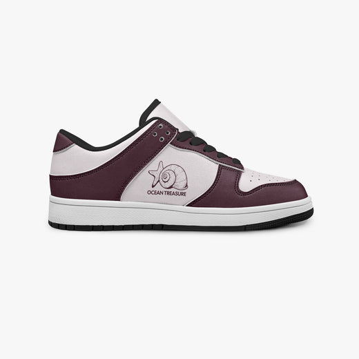 Side profile view of the right sneaker showcasing the burgundy and pale pink color blocking, "OCEAN TREASURE" graphic, black laces, and black rubber outsole facing right.