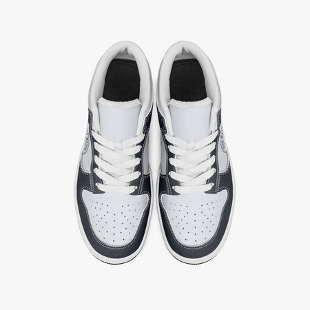 Overhead view of navy and white sneakers showing clean white laces, white padded collar lining, and perforated white leather toe boxes.