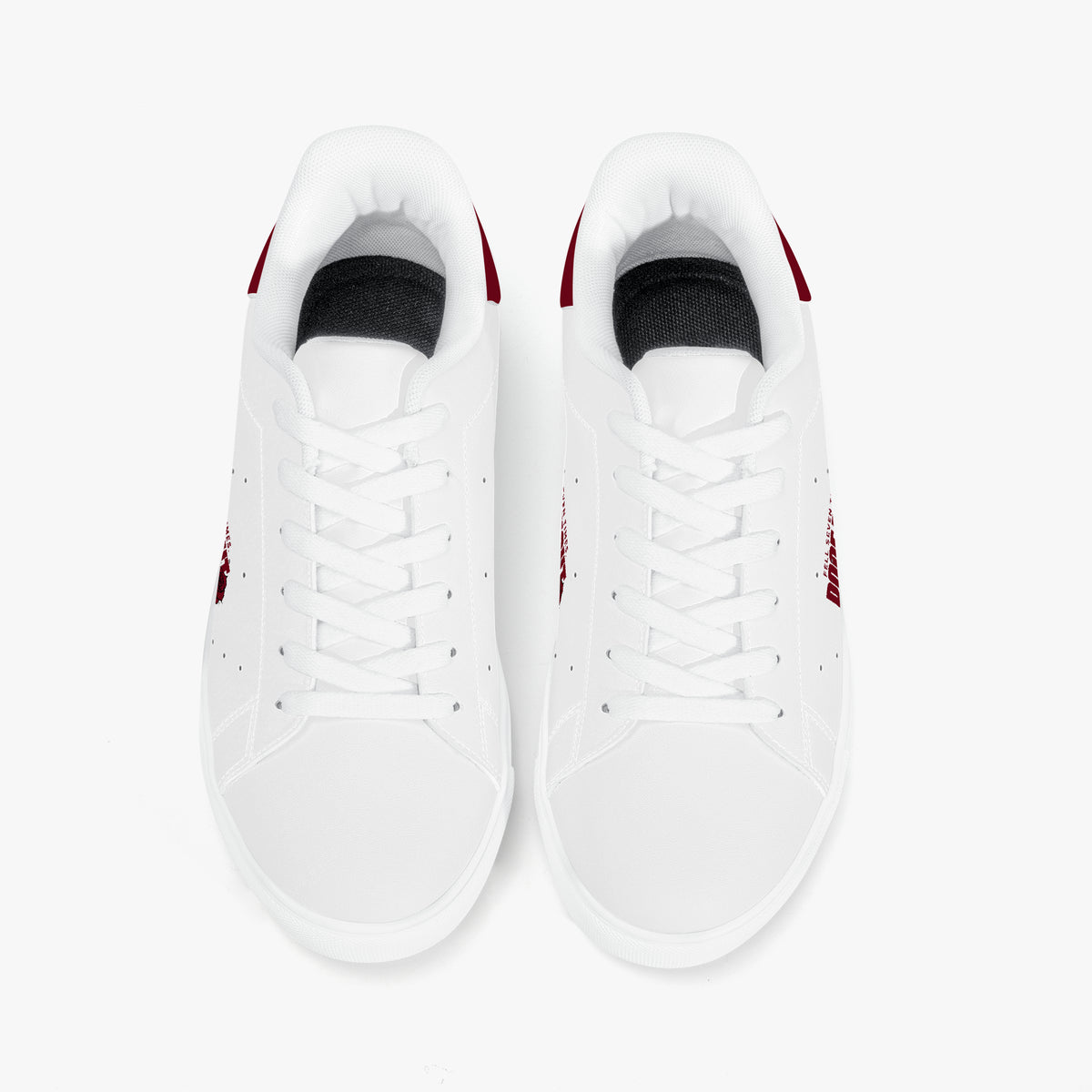 A pair of white low-top sneakers shown from a top-down view on a clean white background. The sneakers feature white laces, white leather or synthetic uppers, black inner lining, and small red accents on the heel and side.