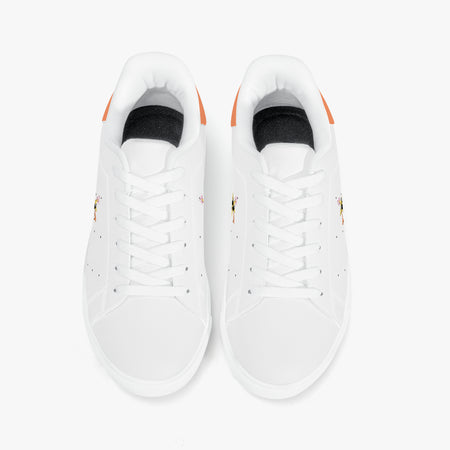A pair of white low-top sneakers shown from a top-down view on a clean white background. The shoes feature white laces, a black interior lining, and small orange heel accents.