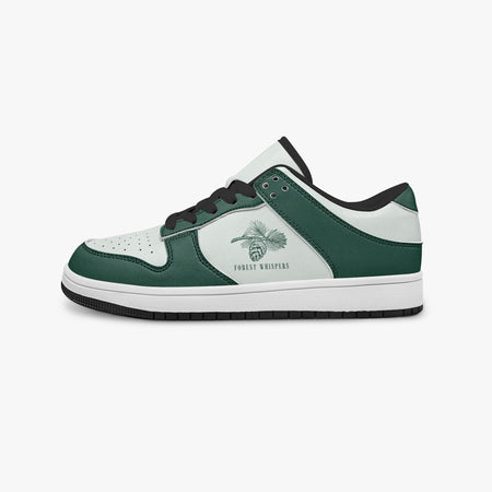 Side profile view of the left sneaker highlighting the green leather panels, pine cone emblem, black interior lining, and flat rubber sole facing right.