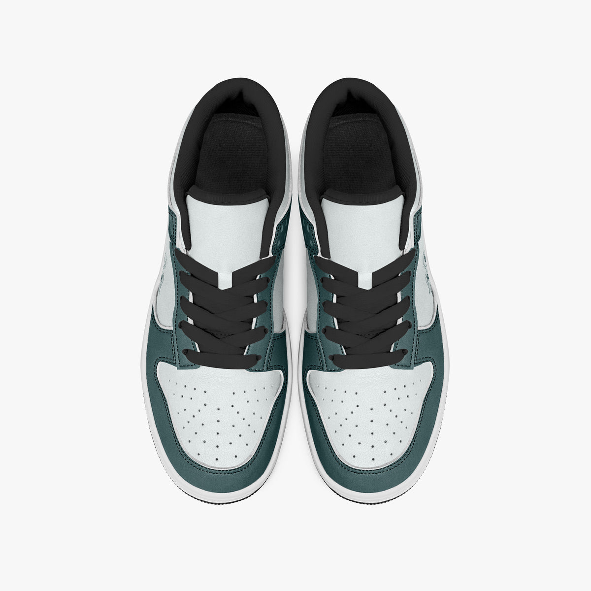 Overhead view of dark teal and white sneakers showing the black laces, perforated toe boxes, padded collars, and white leather uppers.